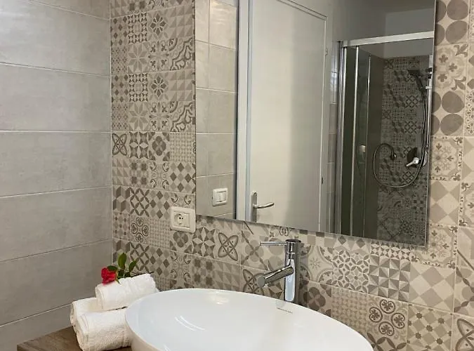 Palm House Affitta Affittacamere Tortolì